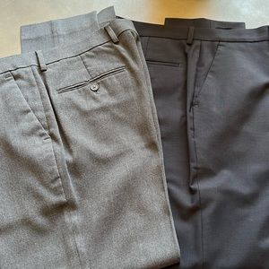 Two pairs of men’s Express extra slim dress pants